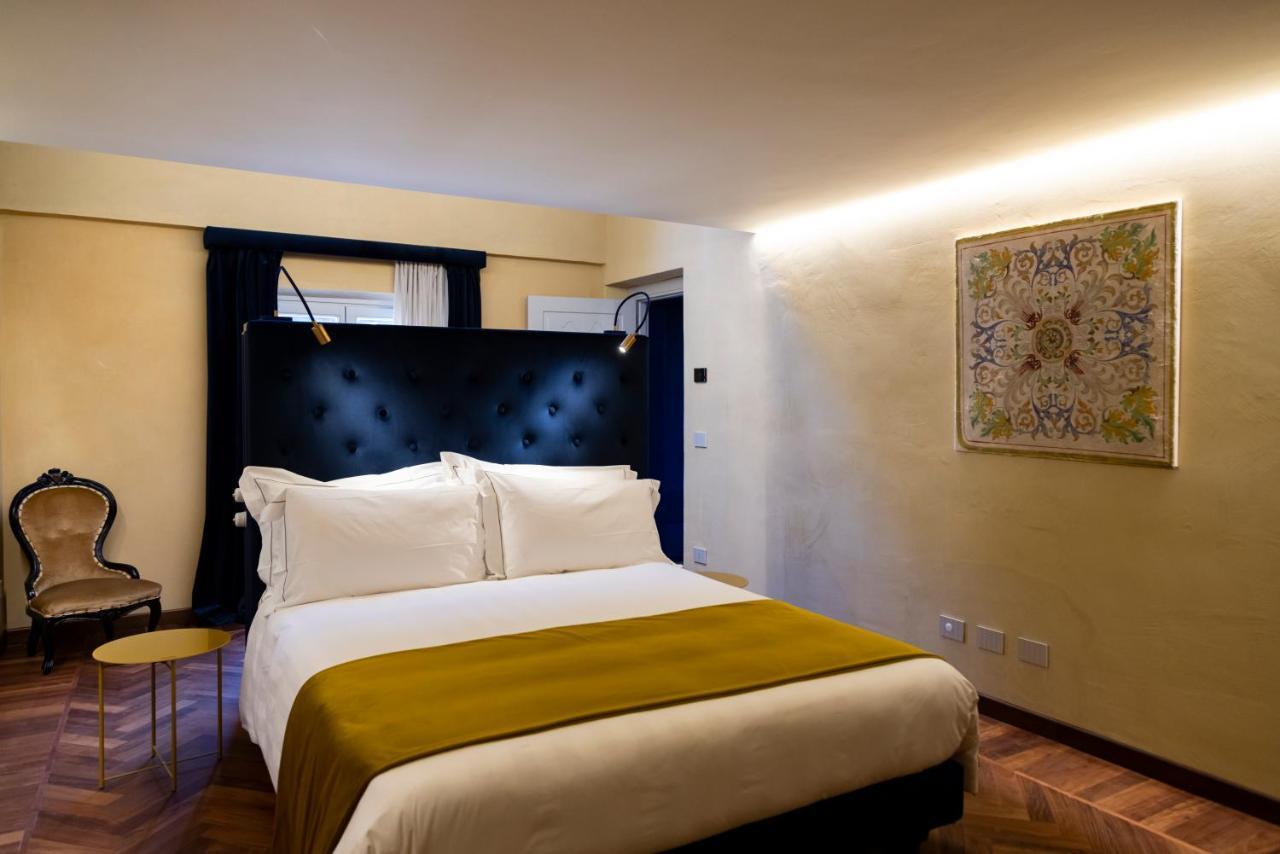 Palazzo Fauzone Relais Bed & Breakfast มอนโดวี ภายนอก รูปภาพ